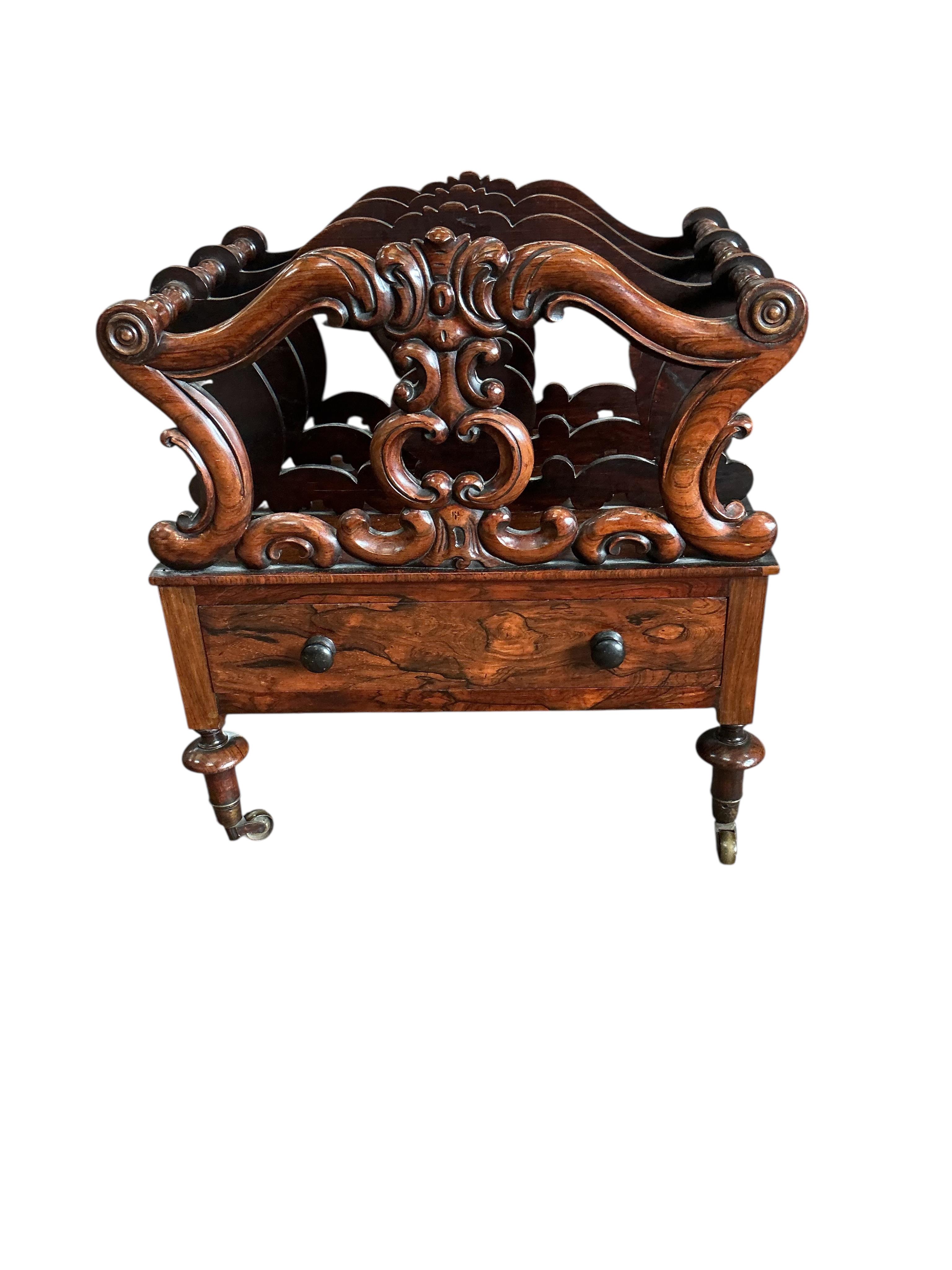 A Victorian rosewood three division Canterbury, width 56cm, depth 41cm, height 58cm